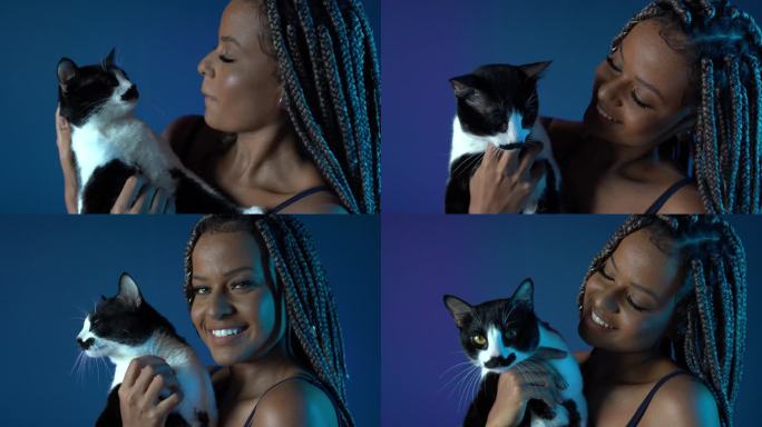非洲女人抱着一只猫