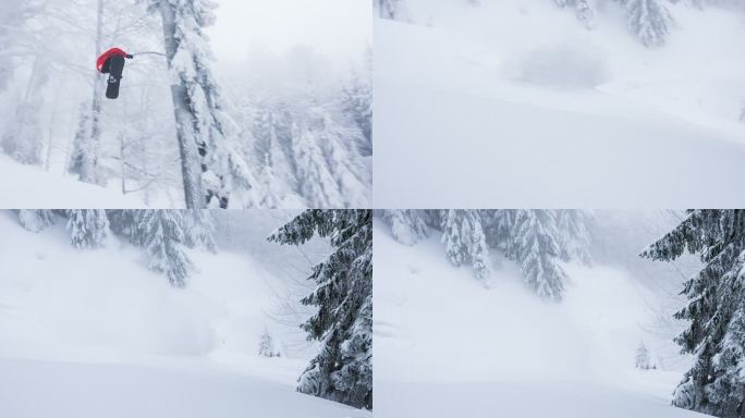 免费滑雪者从悬崖上跳下，在壮丽的冰冻景色中降落在刚落下的雪上