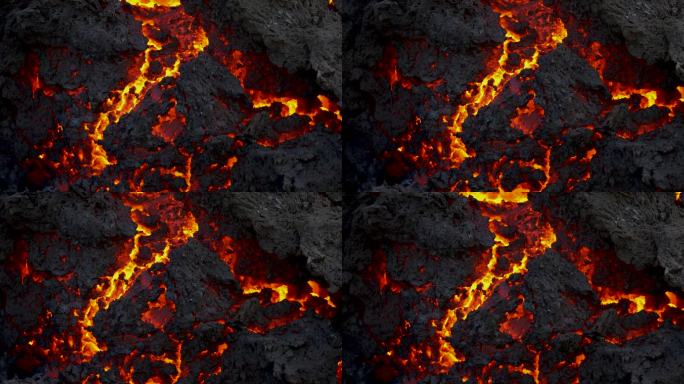 冰岛火山喷发燃烧的新鲜熔岩的风景特写图