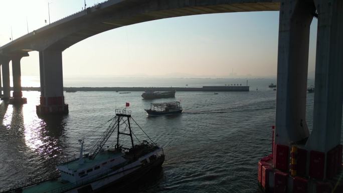 渔港码头跨海大桥夕阳日出渔船出海