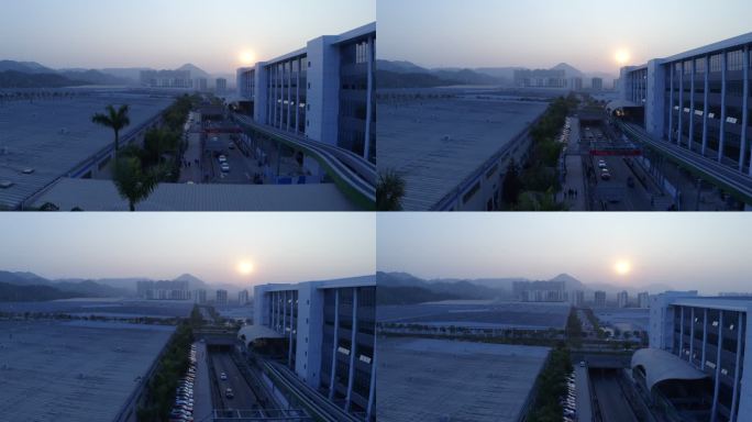 航拍比亚迪深圳厂区清晨 日出 远山角度