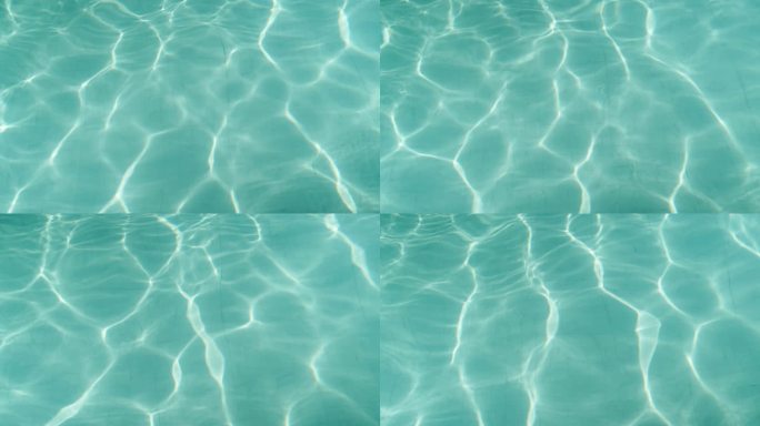 在游泳池中，水以入射光的模式波动。