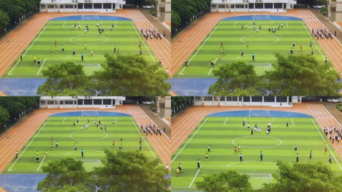 中小学学校学生操场上上体育课训练足球