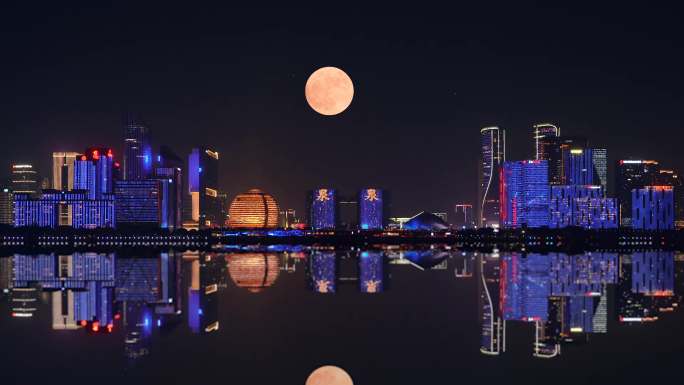 杭州钱江新城灯光秀满月升起延时