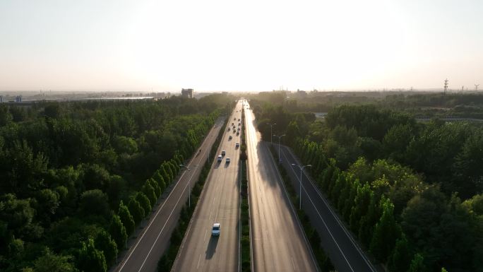 公路航拍两旁树林夕阳