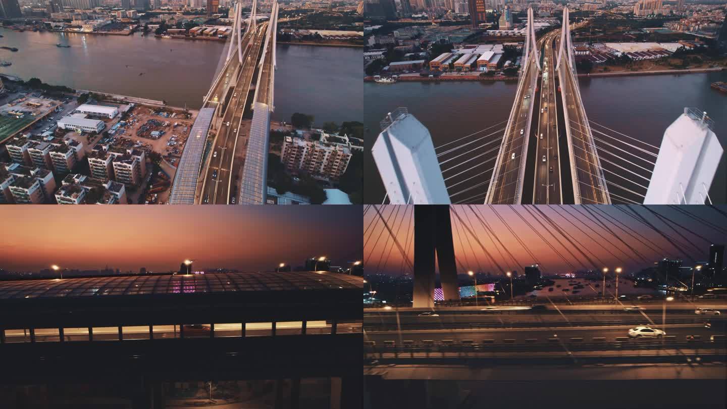 航拍傍晚霞光中的广州新洛溪大桥