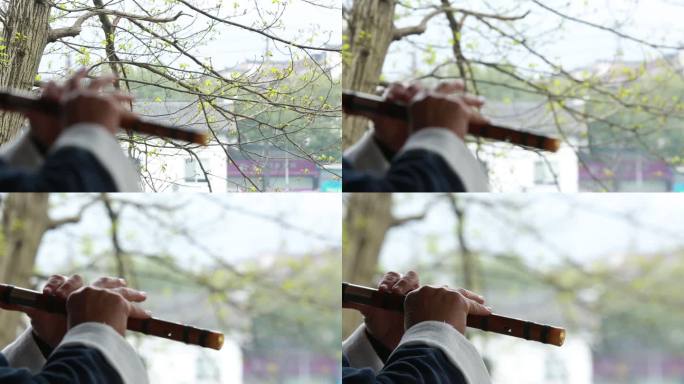 老人皱纹双手演奏传统乐器竹笛横笛笛子笛萧