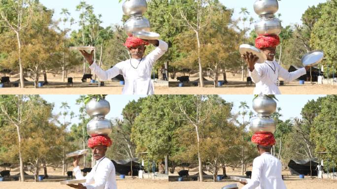 头上戴着水壶跳舞的印度女人