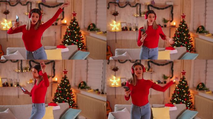 圣诞节在家唱歌跳舞的女人