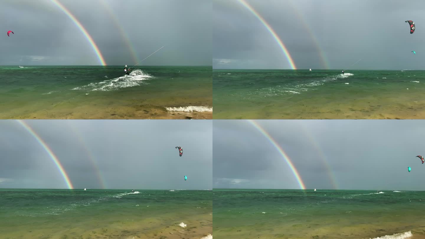 双彩虹下的风筝冲浪爱好者