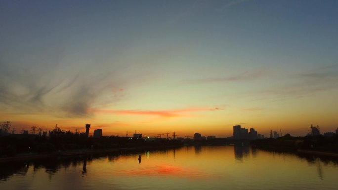 落日余晖城市晚霞河边落日夕阳红夕阳无限好