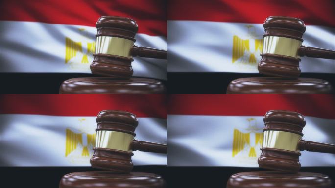 带埃及国旗背景的法官木槌