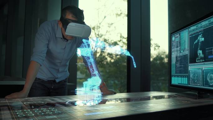 未来派男性工程师戴着虚拟现实眼镜，与未来派全息工业技术机器人手臂控制、未来派工业理念一起工作。