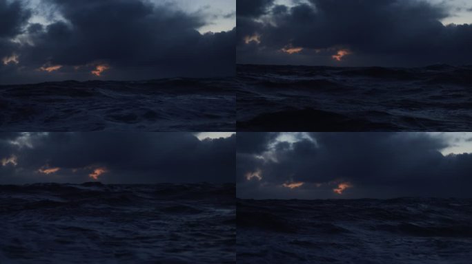 从夜晚蓝色波涛汹涌的大海中的船上：波涛黑暗的海景