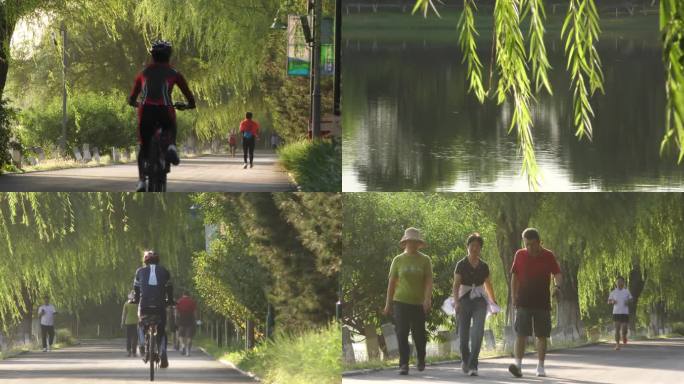 早晨清晨公园骑行水边城市晨练跑步骑行锻炼