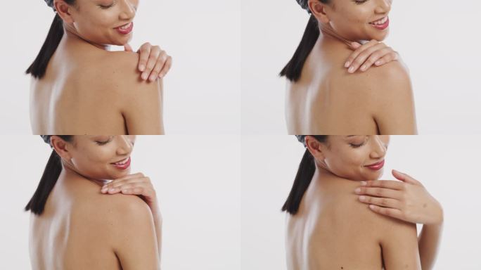一位年轻女性在皮肤上涂抹保湿霜的4k视频片段