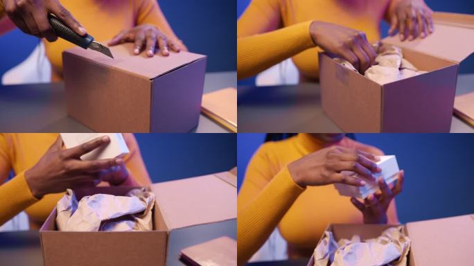 打开礼品盒的特写，里面有一个小盒子