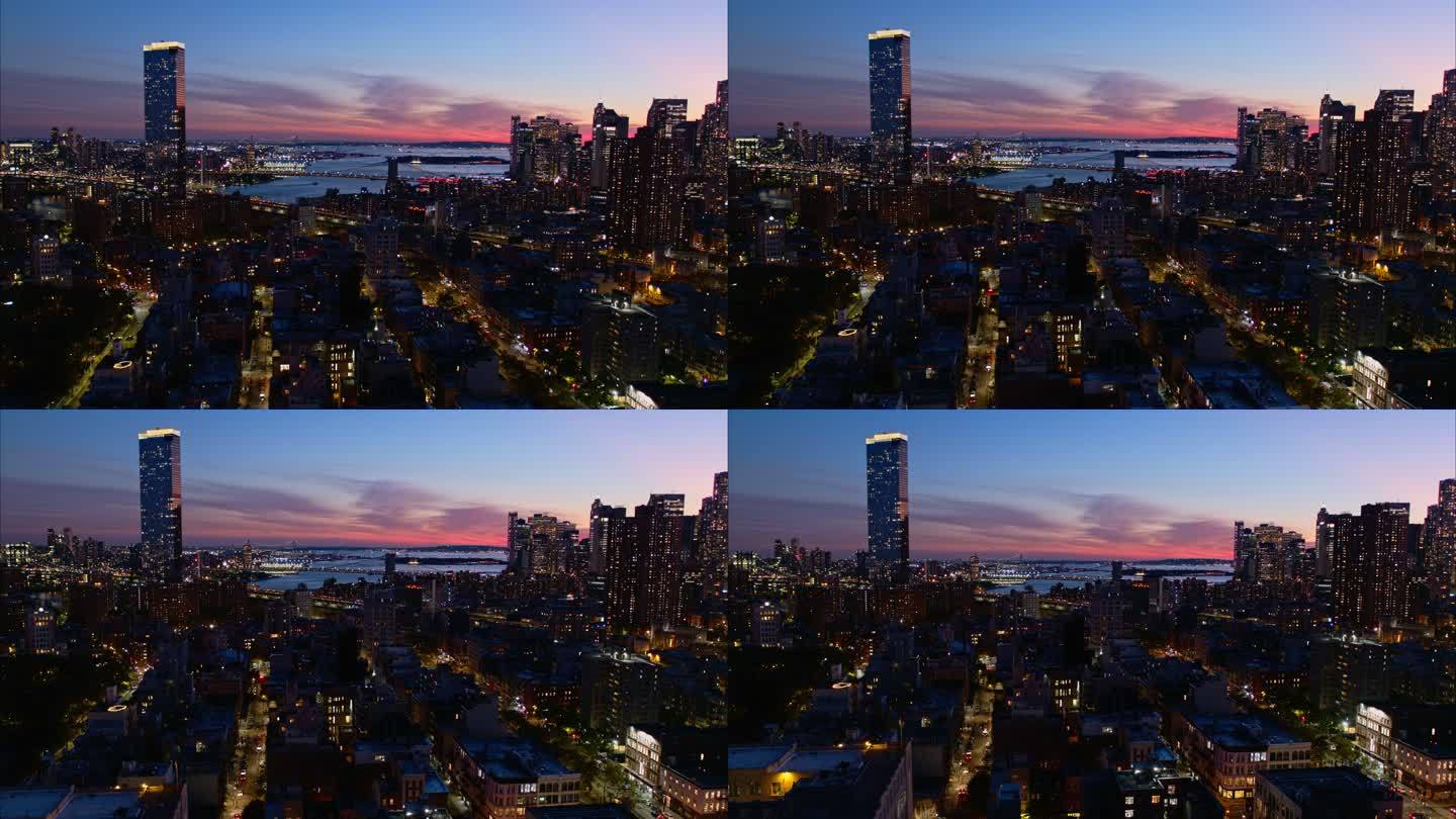 曼哈顿大桥、东河上的布鲁克林大桥和远处的维拉扎诺大桥。日落时分，纽约曼哈顿住宅区和项目的全景。摄像机