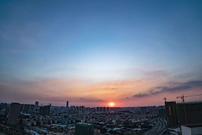 中山市傍晚天奕楼顶相机拍摄中山城市夕阳