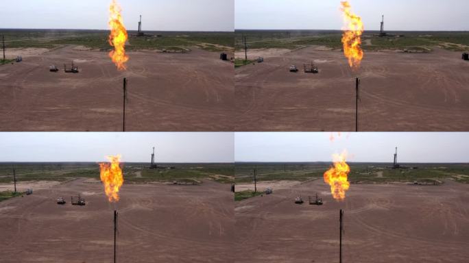 新墨西哥州水力压裂钻机的空中无人机剪辑，气体燃烧