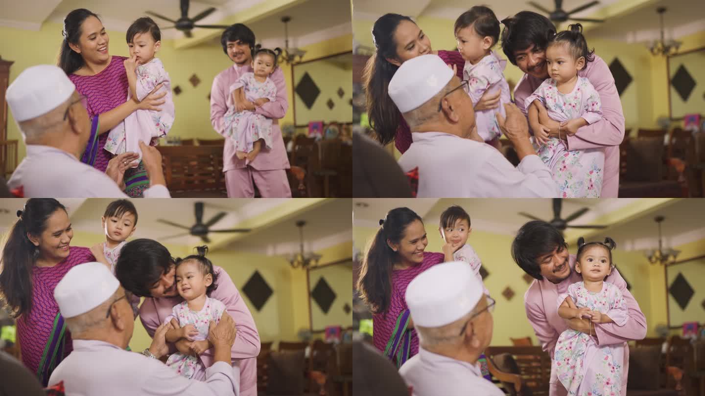 一个马来穆斯林孙子和他的家人穿着传统服装，在艾迪尔菲特里庆典上向他的祖父表示道歉。一个马来家庭在家里