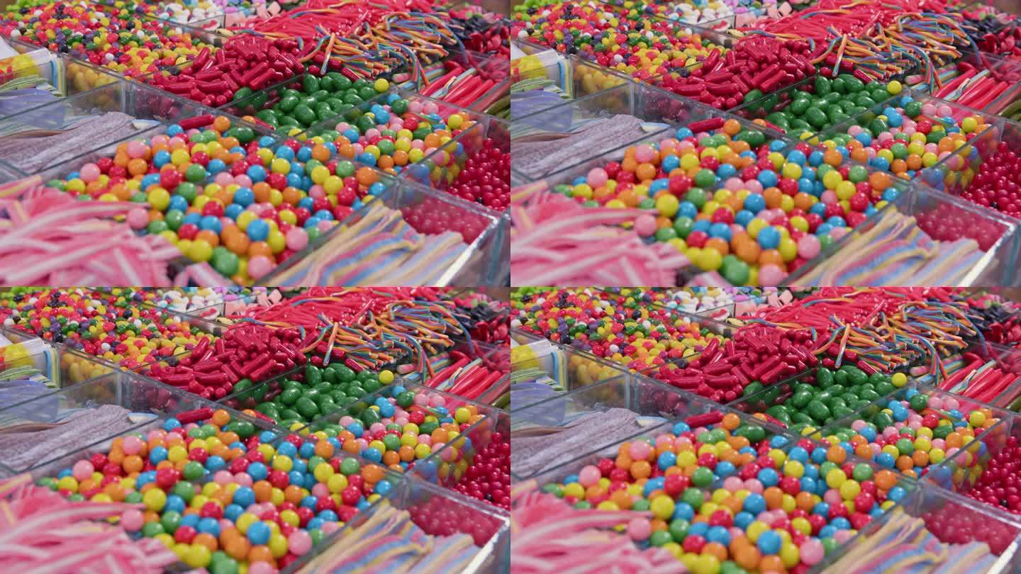 各种果冻色糖果和彩色口香糖球作为背景