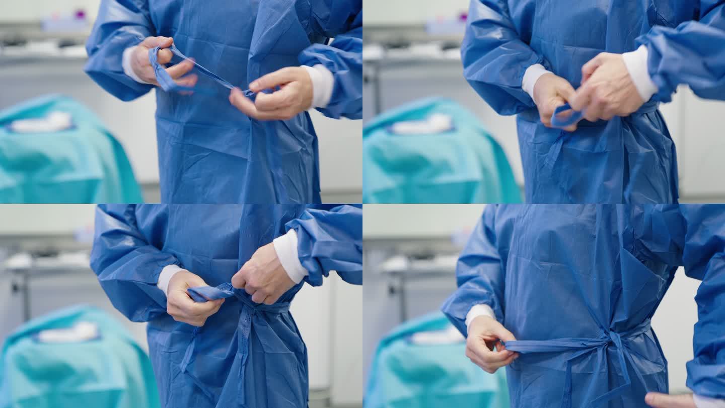 外科医生在手术室穿着无菌衣服的特写镜头