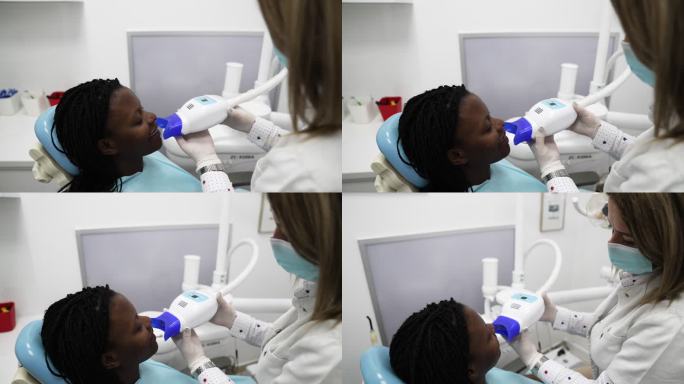 一位年轻女子正在接受牙科治疗。