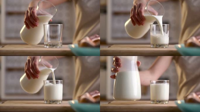 一个面目全非的女性正在往杯子里倒牛奶。