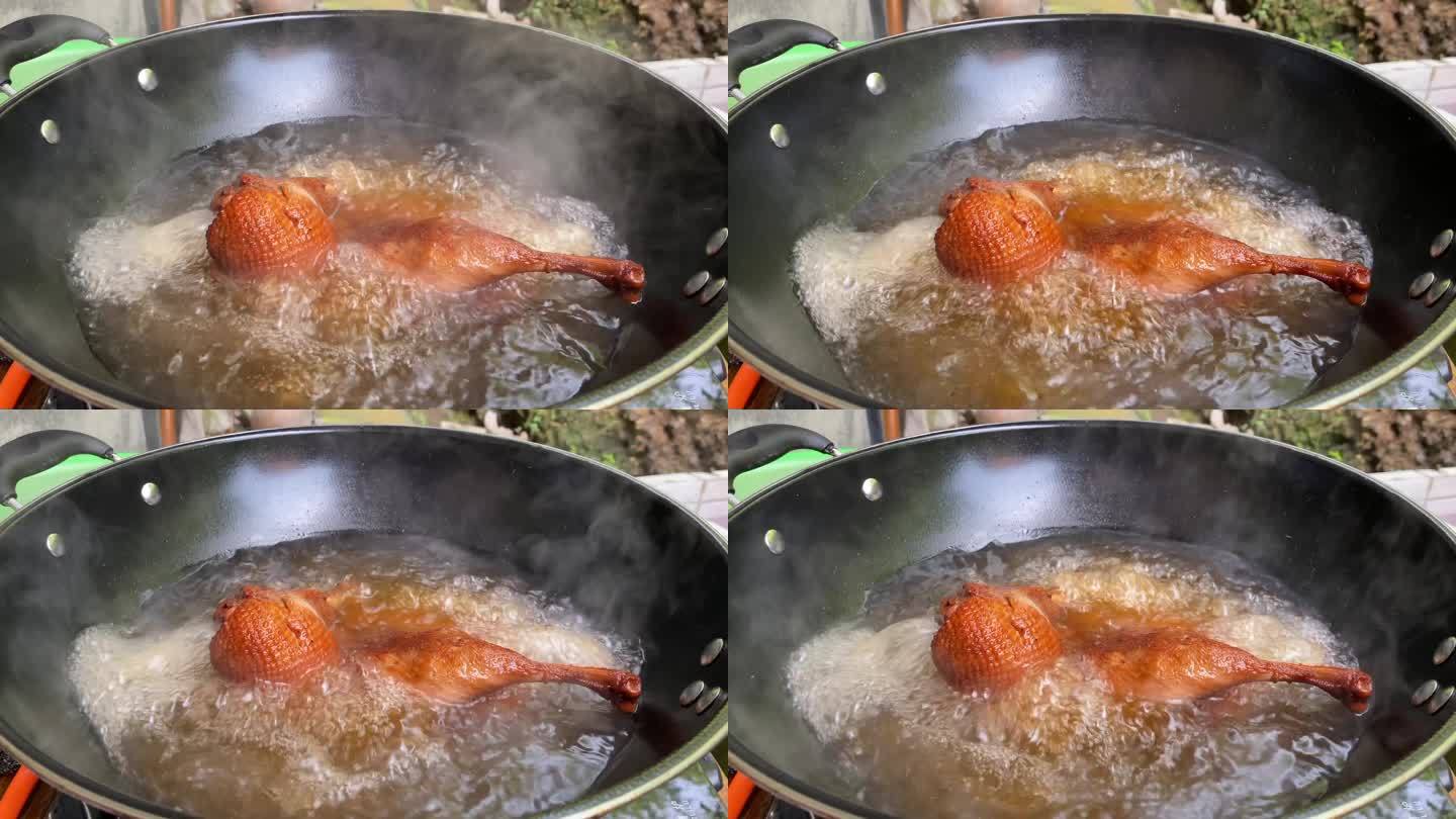 正在锅中煮的卤鸭腿