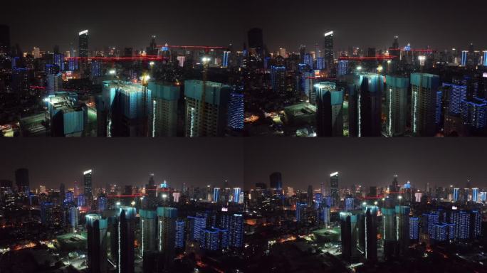 繁华都市高楼大厦建设塔吊灯光夜景航拍