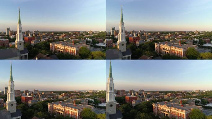 日落前的傍晚，佐治亚州萨凡纳市中心历史街区的全景鸟瞰图，前景是独立长老会教堂。