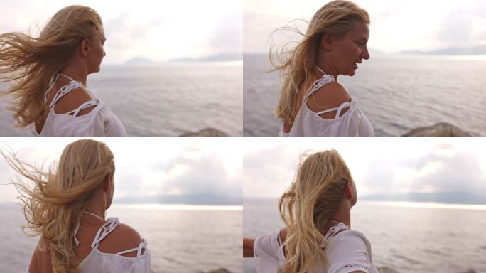意大利厄尔巴岛沿岸一个金发女孩的慢镜头。