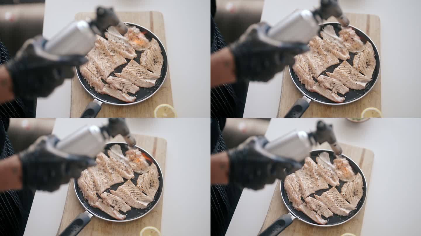 日本厨师烧三文鱼烤鱼料理