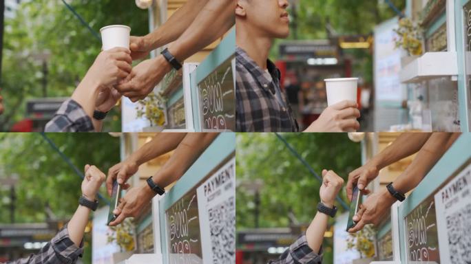 亚洲男子使用智能手表支付