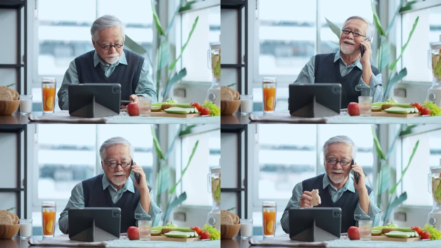 一位退休的亚洲男性，头发灰白，穿着休闲服，享受着悠闲的早餐，喝着健康的饮料，在现代公寓的餐桌上阅读平