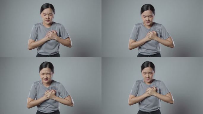 一位亚洲妇女胸痛。