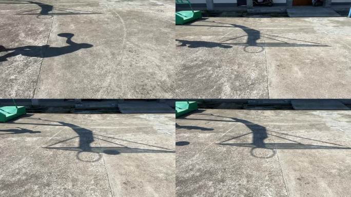 农村乡村水泥篮球场少年一个人打球阳光影子