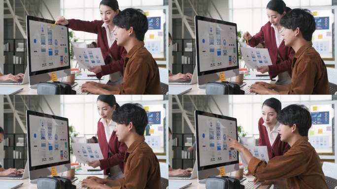 亚洲女性领导者反馈：移动应用程序设计线框原型，开发人员在现代办公室的台式电脑上