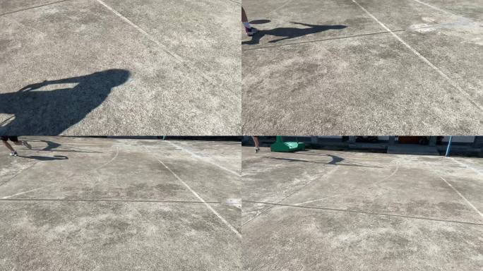 农村乡村水泥篮球场少年一个人打球阳光影子