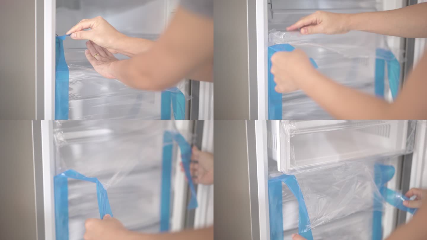 手取下保护膜拆除冰箱上的塑料包装小家电购