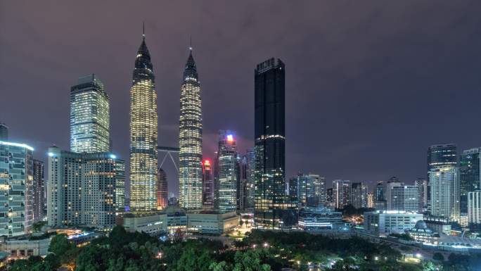 马来西亚吉隆坡吉隆坡市摩天大楼日夜兼程日出场景