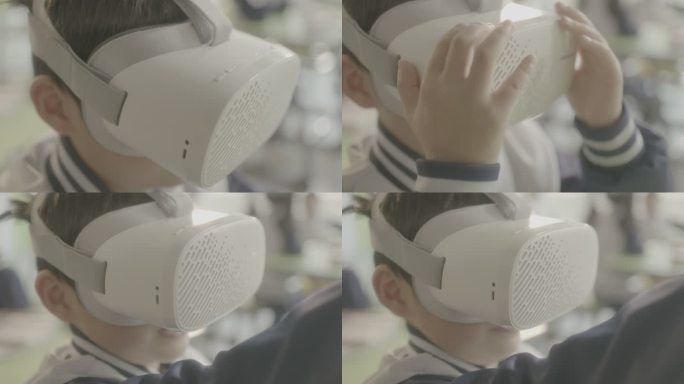 小男孩带着VR眼镜伸手