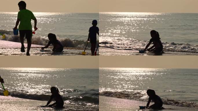 海边沙滩黄昏周末小女孩小男孩在玩水