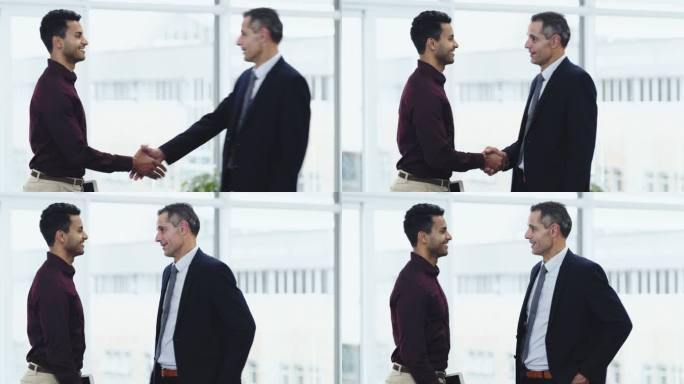 两名商人在现代化办公室握手的4k视频片段