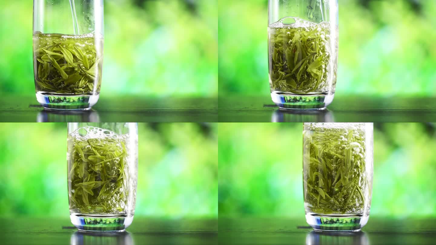 玻璃杯中上下翻腾的绿茶茶叶移轴