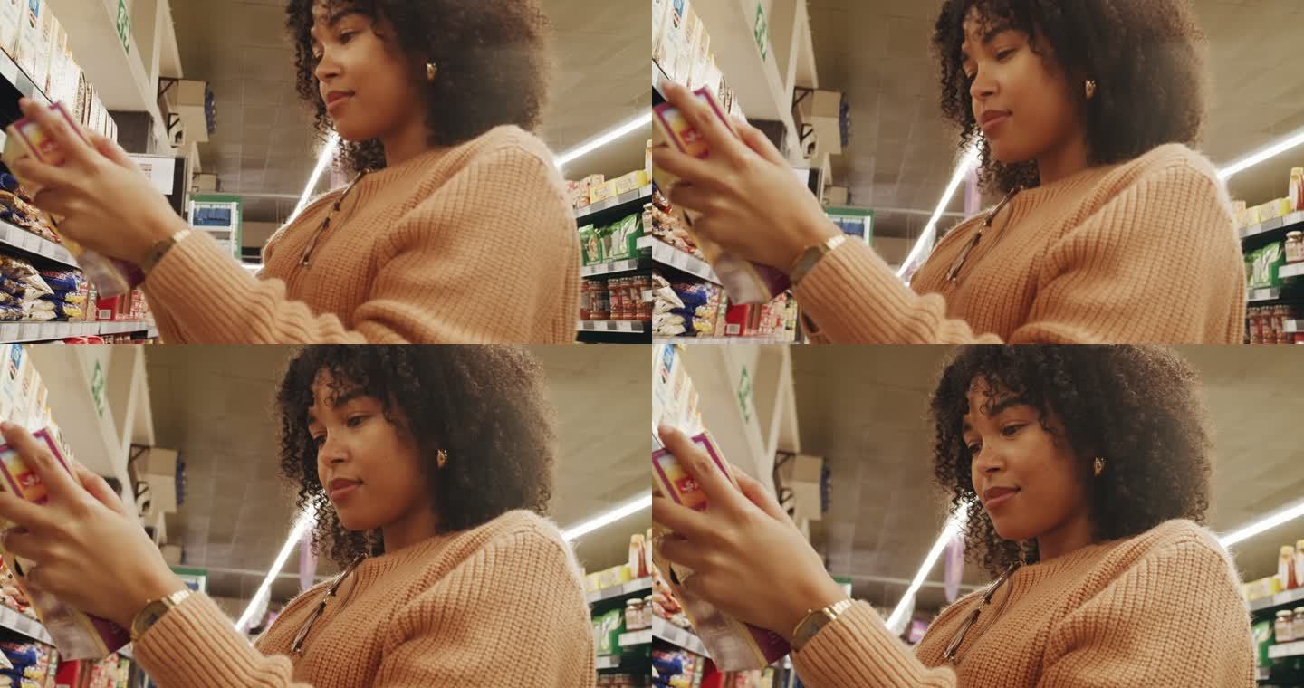 在超市购物的女人。一名年轻女性在商店里看着一个产品，读着标签。站在商店过道内选择谷物的人
