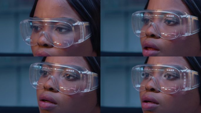 一位女性研究人员使用带有数字屏幕的数字眼镜来查看虚拟DNA模型。数据和重要参数显示在数字眼镜中。