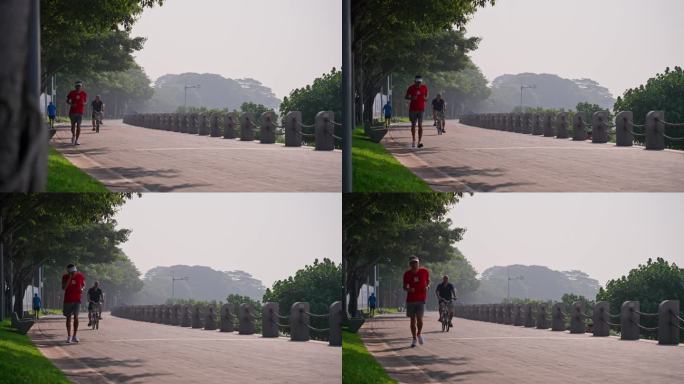 4K正版-深圳湾公园海边步道晨跑的人08