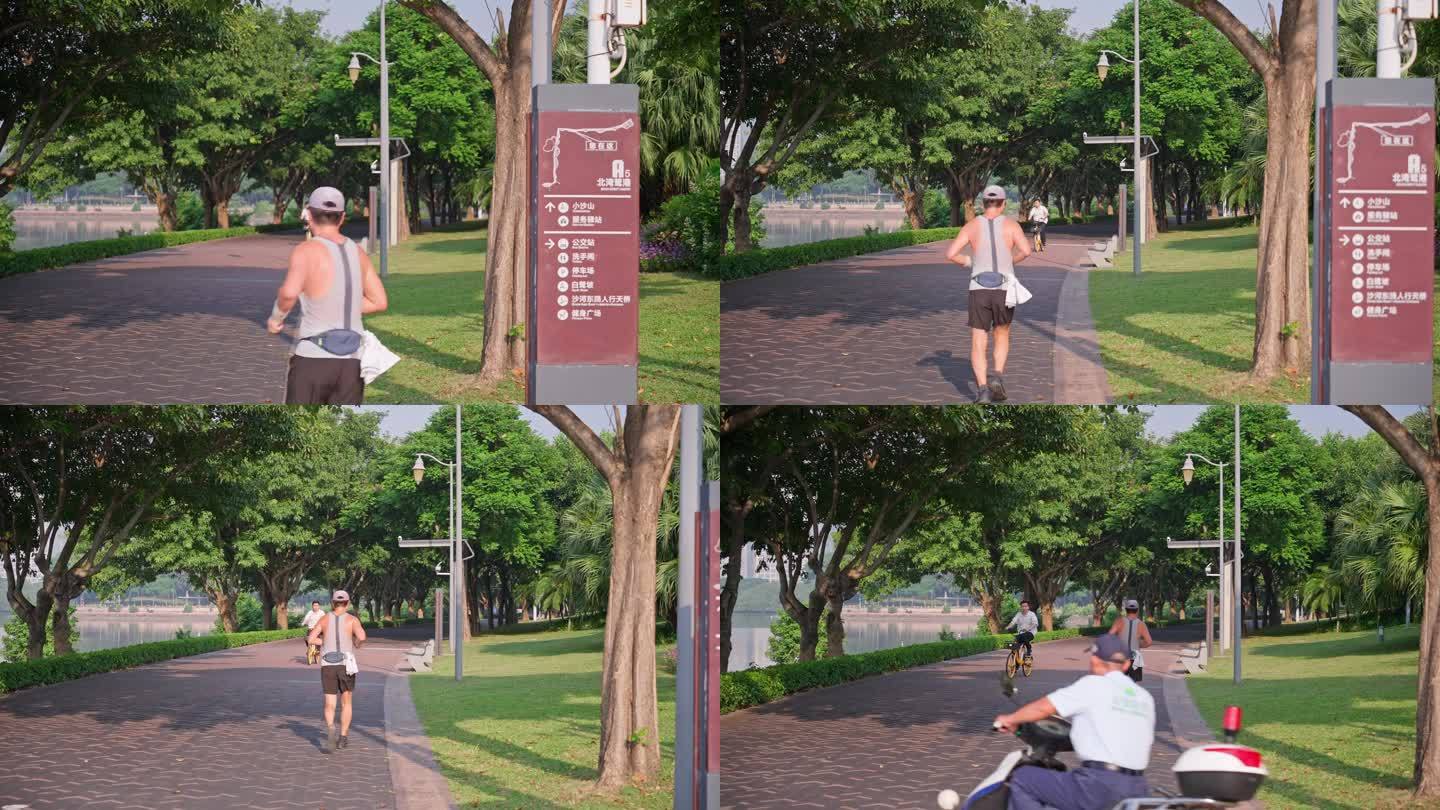 4K正版-深圳湾公园海边步道晨跑的人01